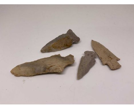 Four Neolithic flint arrow heads, largest 7cm.  (4)