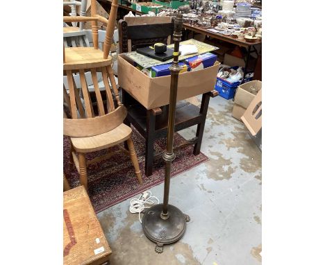 Brass standard lamp on paw feet