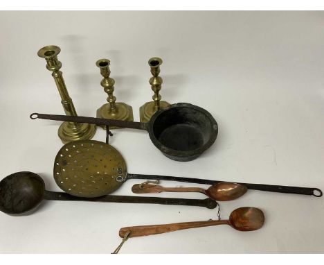 Items of 18th century metalwork to include a brass and iron skimmer, bronze ladle and one other with rest, two Georgian coppe