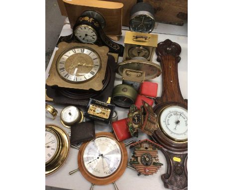 Group of vintage clocks and barometers