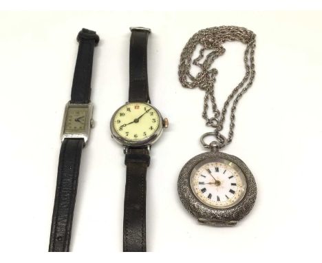 Two vintage silver cased wristwatches and a silver cased fob watch on silver chain