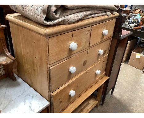Victorian waxed pine chest of two short and two long drawers with white ceramic bun handles, 89cm wide, 43cm deep, 75cm high