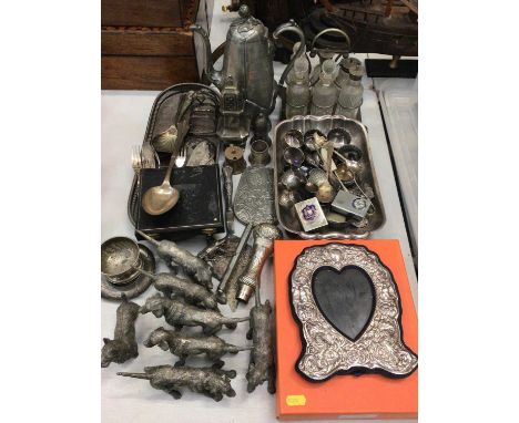 Silver plate and metal ware including hound ornaments, photo frame, glass condiment set in stand, napkin rings, flatware etc