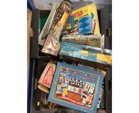 Group of vintage toys to include one box of mixed games, one box of model kits, one box of assembled models and one box of mo