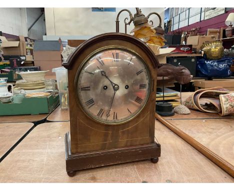 Edwardian Mahogany mantle clockThe clock has a fusee movement.