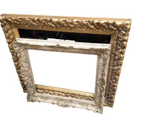 Two large gilt frames, together with an oil on board by Alwin 'Bunny' Adcock, a large horse racing print and a framed set of 