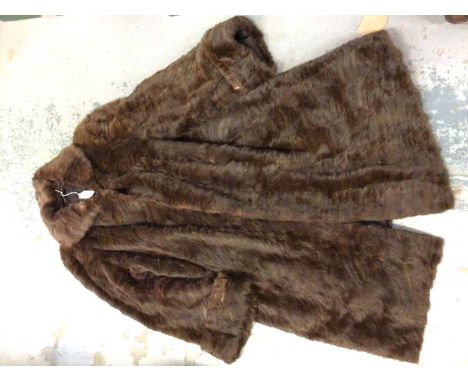 Vintage fur coats, stoals and Victorian parasol