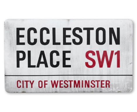 An enamelled iron street sign for Eccleston Place SW1, City of Westminster, with iconic and black and red sans serif letterin