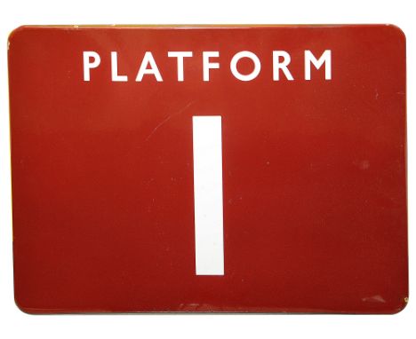 A BR(M) enamel sign displaying 'PLATFORM 1',with white letters on a maroon ground,height 45.8cm, width 60.8cmCondition: small