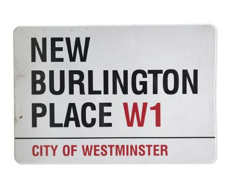An enamelled iron street sign for New Burlington Place W1, City of Westminster with iconic black and red sans serif lettering