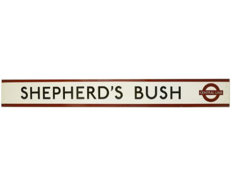 A London Underground enamel station frieze sign for Shepherd's Bush,black lettering on white ground with red edging and round