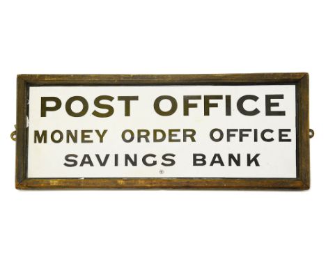 A Post Office framed enamel sign,height 17.7cm, width 69cmCondition: some losses to the edges and marks and stains to the sur