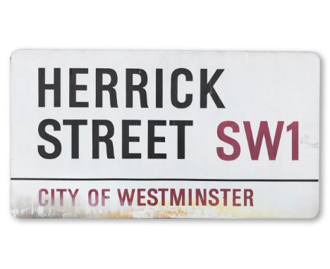 An enamelled iron street sign for Herrick Street SW1, City of Westminster, with iconic and black and red sans serif lettering