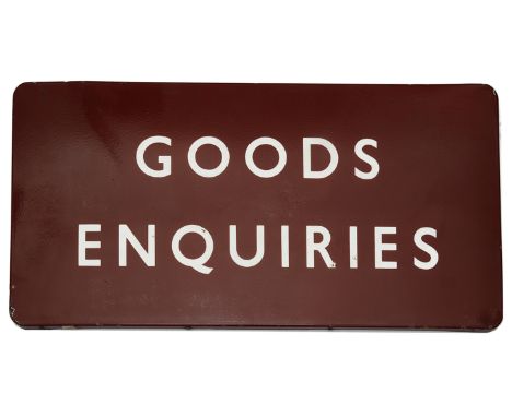 A BR(M) enamel sign displaying 'GOODS ENQUIRIES',white lettering on maroon ground, height 45.7cm, width 91.4cmCondition: The 