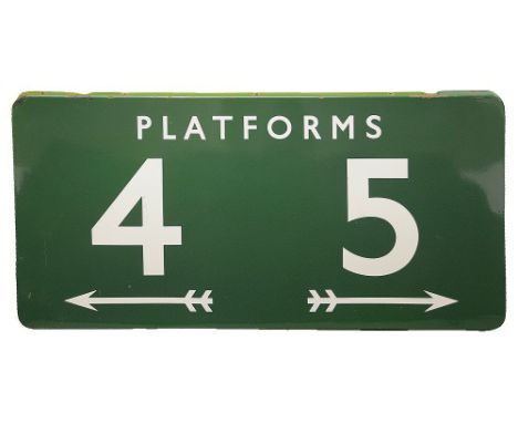 A BR(S) enamel sign displaying 'PLATFORMS / 4 &amp; 5'with white lettering on a green ground, with two double-flighted arrows