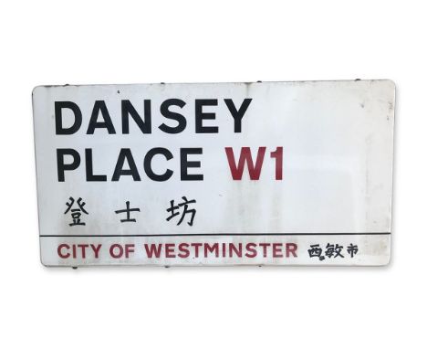 An enamelled iron street sign for Dansey Place W1 Chinatown, City of Westminster with iconic black and red sans serif letteri