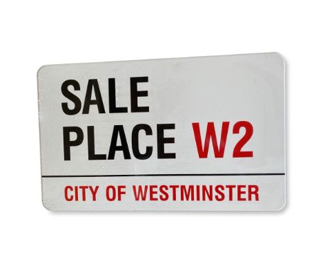 An enamelled iron street sign for Sale Place W2, City of Westminsterwith iconic black and red sans serif lettering first crea