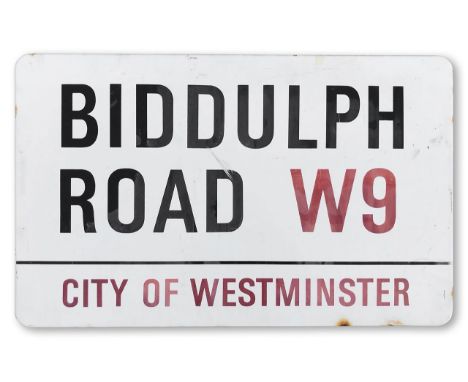 An enamelled iron street sign for Biddulph Road W9, City of Westminster, with iconic and black and red sans serif lettering f