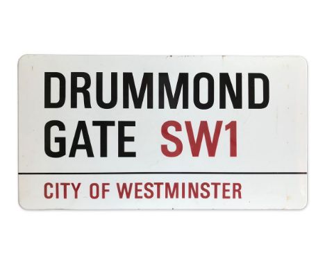 An enamelled iron street sign for Drummond Gate SW1, City of Westminster with iconic black and red sans serif lettering first