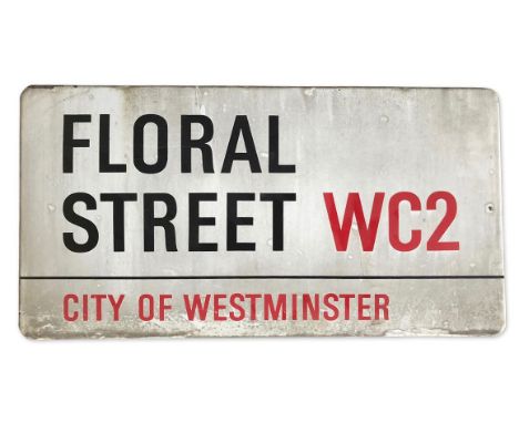 An enamelled iron street sign for Floral Street WC2, City of Westminster with iconic black and red sans serif lettering first