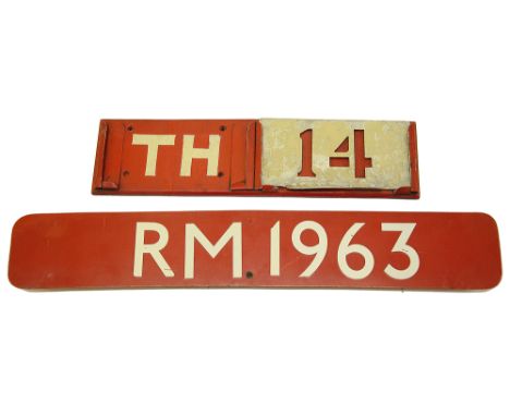 A London Transport Routemaster bus bonnet fleet number plate and a stencil holder,the first displaying 'RM 1963', white lette