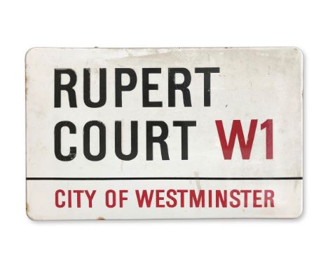 An enamelled iron street sign for Rupert Court W1City of Westminster with iconic black and red sans serif lettering first cre