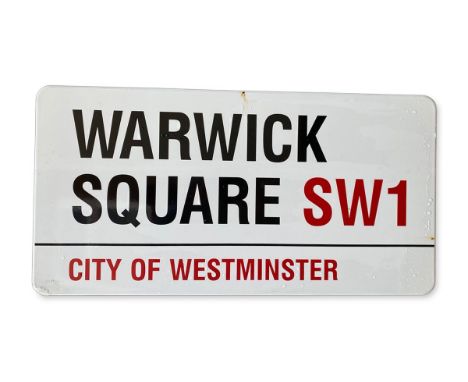 An enamelled iron street sign for Warwick Square SW1 City of Westminster with iconic black and red sans serif lettering first