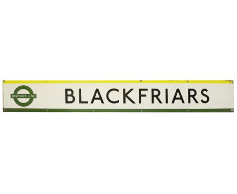 A London Underground enamel station frieze sign for Blackfriars,black lettering on white ground with green and yellow edging 