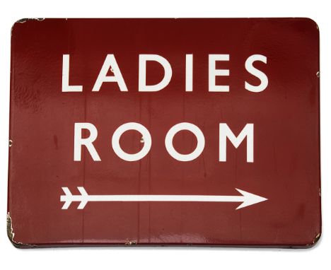 A BR(M) enamel direction sign displaying 'LADIES ROOM',white lettering on a red ground with a double-flight arrow facing righ