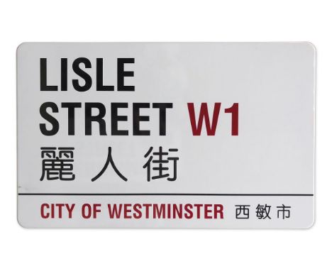An enamelled iron street sign for Lisle Street W1 Chinatown, City of Westminster with iconic black and red sans serif letteri