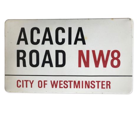 An enamelled iron street sign for Acacia Road NW8, City of Westminster with iconic black and red sans serif lettering first c