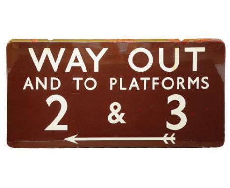 A BR(M) enamel sign displaying 'WAY OUT / AND TO PLATFORMS / 2 &amp; 3',with white lettering on a maroon ground, with double-