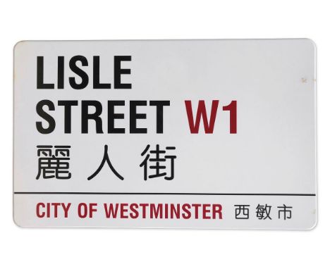 An enamelled iron street sign for Lisle Street W1 Chinatown, City of Westminster with iconic black and red sans serif letteri