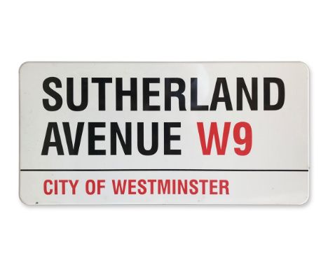 An enamelled iron street sign for Sutherland Avenue W9, City of Westminster with iconic black and red sans serif lettering fi