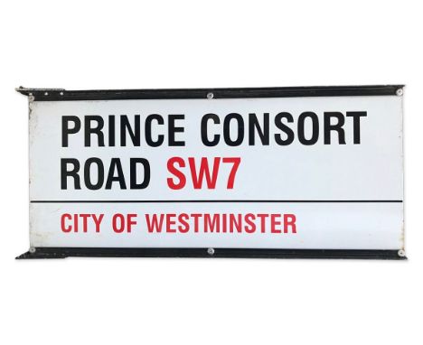 A double sided enamelled iron street sign on brackets for Prince Consort Road SW7, City of Westminsterwith iconic black and r