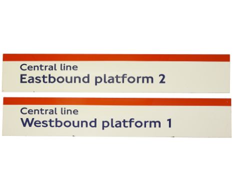 Two London Underground enamel station frieze signs displaying 'Central line / Westbound platform 1' and 'Central line / Eastb