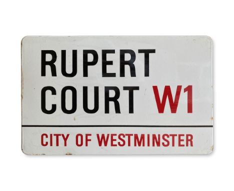 An enamelled iron street sign for Rupert Court W1, City of Westminster with iconic black and red sans serif lettering first c