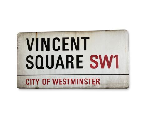 An enamelled iron street sign for Vincent Square SW1, City of Westminster with iconic black and red sans serif lettering firs