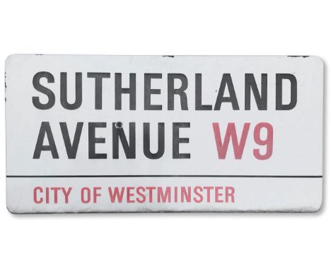 An enamelled iron street sign for Sutherland Avenue W9, City of Westminster, with iconic and black and red sans serif letteri