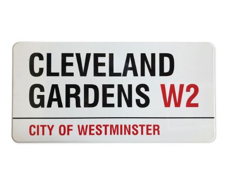 An enamelled iron street sign for Cleveland Gardens W2, City of Westminster with iconic black and red sans serif lettering fi