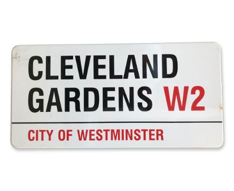 An enamelled iron street sign for Cleveland Gardens W2, City of Westminster with iconic black and red sans serif lettering fi
