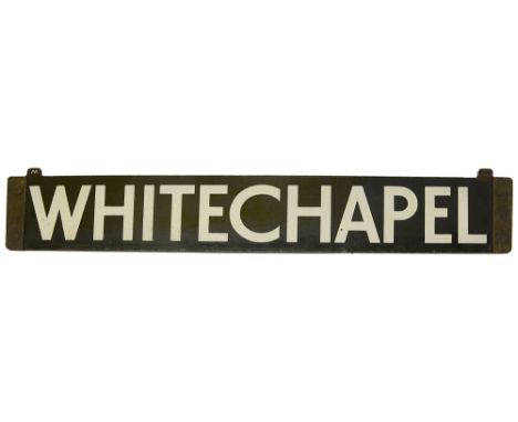 A London Underground enamel cab destination plate for WHITECHAPEL,with white lettering on a black ground, brass fittings to e