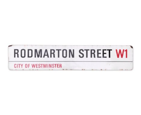 An enamelled iron street sign for Rodmarton Street W1, City of Westminster with iconic black and red sans serif lettering fir