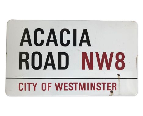 An enamelled iron street sign for Acacia Road NW8, City of Westminster with iconic black and red sans serif lettering first c