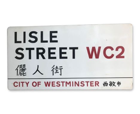 An enamelled iron street sign for Lisle Street WC2 Chinatown, City of Westminster with iconic black and red sans serif letter