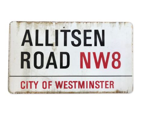 An enamelled iron street sign for Allitsen Road NW8, City of Westminster with iconic black and red sans serif lettering first