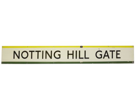 A London Underground enamel station frieze sign for Notting Hill Gate,black lettering on white ground with green and yellow e