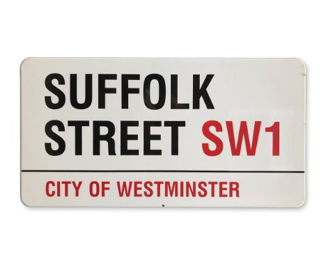 An enamelled iron street sign for Suffolk Street SW1City of Westminster with iconic black and red sans serif lettering first 