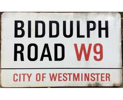 An enamelled iron street sign for Biddulph Road W9, City of Westminster, with iconic black and red sans serif lettering first