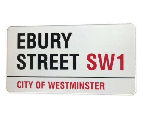 An enamelled iron street sign for Ebury Street SW1, City of Westminster with iconic black and red sans serif lettering first 